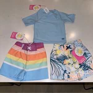 NWT RuggedButts Rufflebutts Rashguard Swim Trunks Rainbow Birds Paradise 3-6